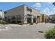 Well-maintained restaurant exterior with large windows and an inviting entrance, nestled on a walkable street at 6930 Whitman Walk, Alpharetta, GA 30005