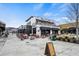 Stylish restaurant exterior featuring outdoor dining and covered seating for an enjoyable experience at 6930 Whitman Walk, Alpharetta, GA 30005