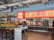 Open restaurant interior showcasing various food vendors, offering a diverse culinary experience in a communal setting at 6930 Whitman Walk, Alpharetta, GA 30005