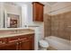 Bathroom with a vanity, toilet, bathtub, and shower with tile at 825 Highland Ne Ln # 1116, Atlanta, GA 30306