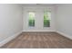 Bedroom featuring windows and carpet flooring at 825 Highland Ne Ln # 1116, Atlanta, GA 30306
