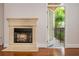 Fireplace with access to an outdoor area that includes an iron railing at 825 Highland Ne Ln # 1116, Atlanta, GA 30306