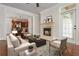 Inviting living room with a cozy fireplace, neutral tones, and plenty of natural light at 825 Highland Ne Ln # 1116, Atlanta, GA 30306