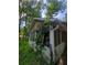 View of a screened in porch with vines growing on the exterior at 1383 Natchez Sw Trce, Marietta, GA 30008