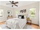 Bright bedroom with hardwood floors, neutral decor, and ample natural light at 217 Rockyford Ne Rd, Atlanta, GA 30317