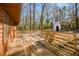 Wooden deck surrounded by a wood railing with a view to the wooded yard at 4800 Timber Ridge Dr, Douglasville, GA 30135