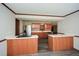 Bright kitchen with ample counter space, stainless steel appliances and wood-look floors at 4800 Timber Ridge Dr, Douglasville, GA 30135