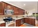 Well-appointed kitchen with stainless steel appliances, granite countertops, and ample cabinet space at 6038 Mayfield Se Way, Mableton, GA 30126