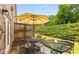 Outdoor patio perfect for entertaining with seating, umbrella, and lush landscaping at 6038 Mayfield Se Way, Mableton, GA 30126