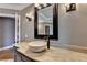 Bathroom vanity with a vessel sink and designer faucet at 10020 Normandy Ln, Suwanee, GA 30024