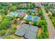 Aerial view of community amenities including tennis courts, pool, and clubhouse at 10020 Normandy Ln, Suwanee, GA 30024