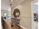 Hallway with wood floors, decorative table, and neutral paint color at 10020 Normandy Ln, Suwanee, GA 30024