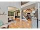 Open floor plan showcases hardwood floors, staircase and seamlessly connects living spaces at 10020 Normandy Ln, Suwanee, GA 30024