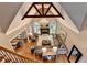 Spacious living room with hardwood floors, fireplace, chandelier and high ceiling at 10020 Normandy Ln, Suwanee, GA 30024