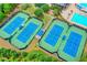 Aerial view featuring community tennis courts, green landscaping, and a partial view of the pool area at 10020 Normandy Ln, Suwanee, GA 30024