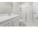 Bathroom with a glass shower, single vanity, and tile flooring at 160 Auburn Gate Ln, Auburn, GA 30011