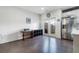 Open kitchen and dining area with stainless steel fridge and backyard access at 160 Auburn Gate Ln, Auburn, GA 30011