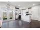 Modern kitchen with white cabinets, stainless steel appliances, and a functional island at 160 Auburn Gate Ln, Auburn, GA 30011