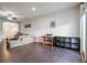 Open-concept living room with hardwood floors, neutral walls, and modern furniture at 160 Auburn Gate Ln, Auburn, GA 30011