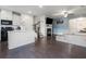 Living space showcasing the kitchen, stairway, and living room with open concept layout at 160 Auburn Gate Ln, Auburn, GA 30011