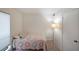 Cozy bedroom featuring neutral walls, carpet, and a comfortable bed with a colorful quilt at 3907 Cedar Cir, Tucker, GA 30084