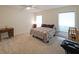 Bright bedroom offering great light, large closets, and comfortable carpet at 3907 Cedar Cir, Tucker, GA 30084