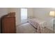 Cozy bedroom with comfortable single bed, soft carpet and dresser at 3907 Cedar Cir, Tucker, GA 30084