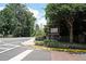 Cedar Circle community entrance with lush landscaping and neighborhood signage at 3907 Cedar Cir, Tucker, GA 30084