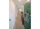 Inviting entryway featuring a decorative green door and a glimpse into the living space at 3907 Cedar Cir, Tucker, GA 30084