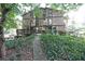 A townhouse with private decks surrounded by mature landscaping at 3907 Cedar Cir, Tucker, GA 30084