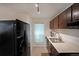 Practical kitchen space includes ample storage cabinets, modern appliances, and functional design at 3907 Cedar Cir, Tucker, GA 30084