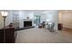 Bright living room with a fireplace, outdoor patio access, and a comfortable rocking chair at 3907 Cedar Cir, Tucker, GA 30084