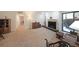 Bright living room showcasing a fireplace, built-in shelves, and access to the outdoor patio at 3907 Cedar Cir, Tucker, GA 30084