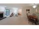 Spacious living room offers a fireplace, sliding glass doors to the outside, and an adjacent dining area at 3907 Cedar Cir, Tucker, GA 30084
