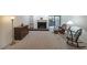 Bright living room featuring a cozy fireplace and access to an outdoor patio at 3907 Cedar Cir, Tucker, GA 30084