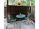 Charming patio with metal chairs and a table, creating a cozy outdoor seating area at 3907 Cedar Cir, Tucker, GA 30084