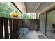Cozy covered patio with a table and chairs, perfect for enjoying the outdoors at 3907 Cedar Cir, Tucker, GA 30084
