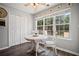 Bright breakfast nook featuring a window with a view of the landscaped backyard at 5010 Amber Leaf Dr, Roswell, GA 30076