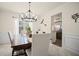 Elegant dining room with modern chandelier and large dining table at 5010 Amber Leaf Dr, Roswell, GA 30076