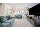 Cozy living room with large windows and comfortable seating area at 5010 Amber Leaf Dr, Roswell, GA 30076