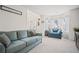 Bright and spacious living room with bay window and comfortable seating at 5010 Amber Leaf Dr, Roswell, GA 30076