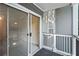 Relaxing balcony with sliding glass doors and grey siding at 5207 Santa Fe Pkwy, Sandy Springs, GA 30350