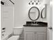 Cozy bathroom with a shower-tub combo and an oval mirror at 5207 Santa Fe Pkwy, Sandy Springs, GA 30350
