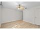 Bright bedroom features ceiling fan and modern vinyl flooring at 5207 Santa Fe Pkwy, Sandy Springs, GA 30350