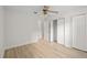 Neutral bedroom featuring modern ceiling fan and lots of closet space at 5207 Santa Fe Pkwy, Sandy Springs, GA 30350