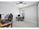 Neutral bedroom with carpet, ceiling fan, window and closet at 5696 Walnut Mill Ln, Powder Springs, GA 30127