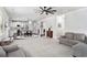 Open-concept living area with a cozy living room, dining area, and a bright kitchen, perfect for entertaining at 5696 Walnut Mill Ln, Powder Springs, GA 30127
