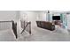 Carpeted loft with ceiling fan, sofa, tv and table and chairs at 5696 Walnut Mill Ln, Powder Springs, GA 30127