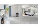 Spacious carpeted main bedroom with fireplace, bed, and ensuite bath at 5696 Walnut Mill Ln, Powder Springs, GA 30127
