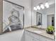 Bathroom features granite countertops, framed mirror, and decorative painting at 6179 Ashbranch Dr, Acworth, GA 30101